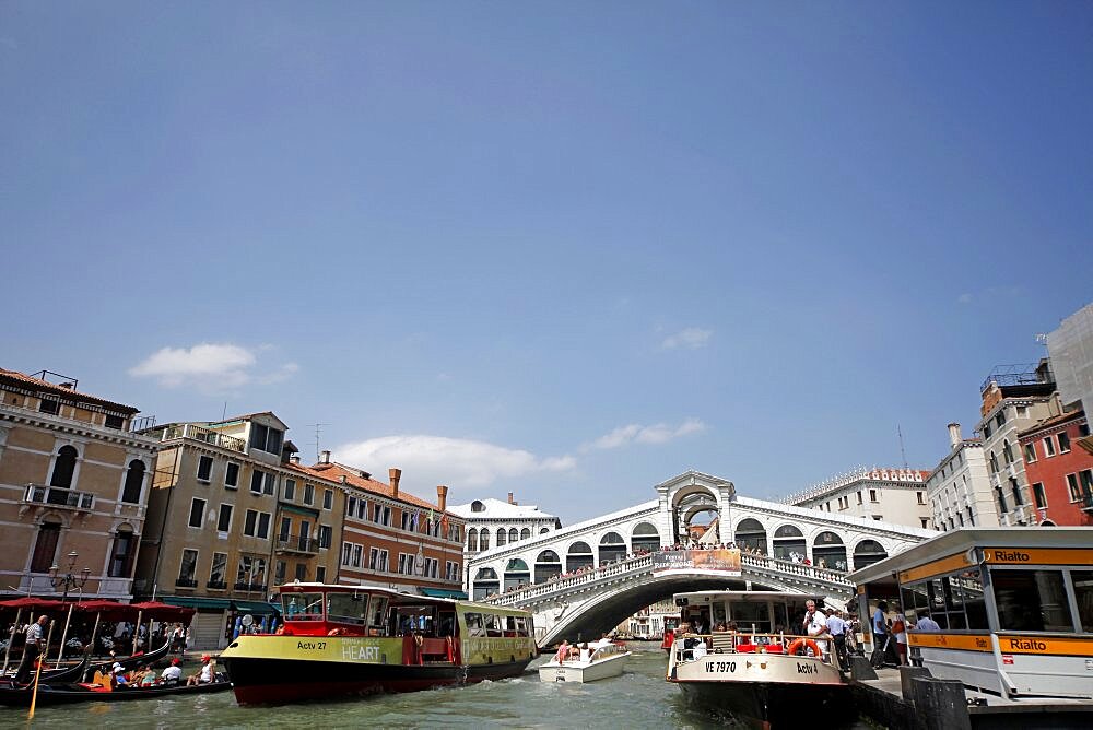 Rialto Bridge and passenger ferries, Venice, UNESCO World Heritage Site, Veneto, Italy, Europe