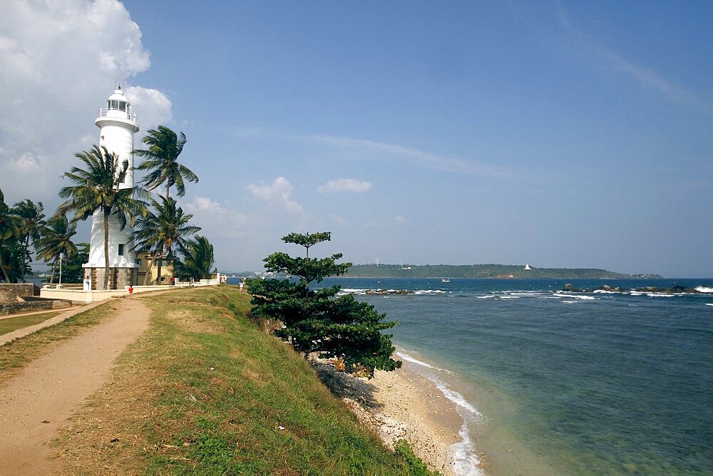 Lighthouse and coconut palm trees, Galle, Sri Lanka, Asia