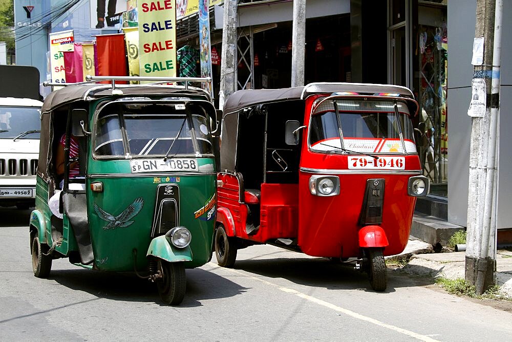 Green and red tuk-tuks, Galle, Sri Lanka, Asia