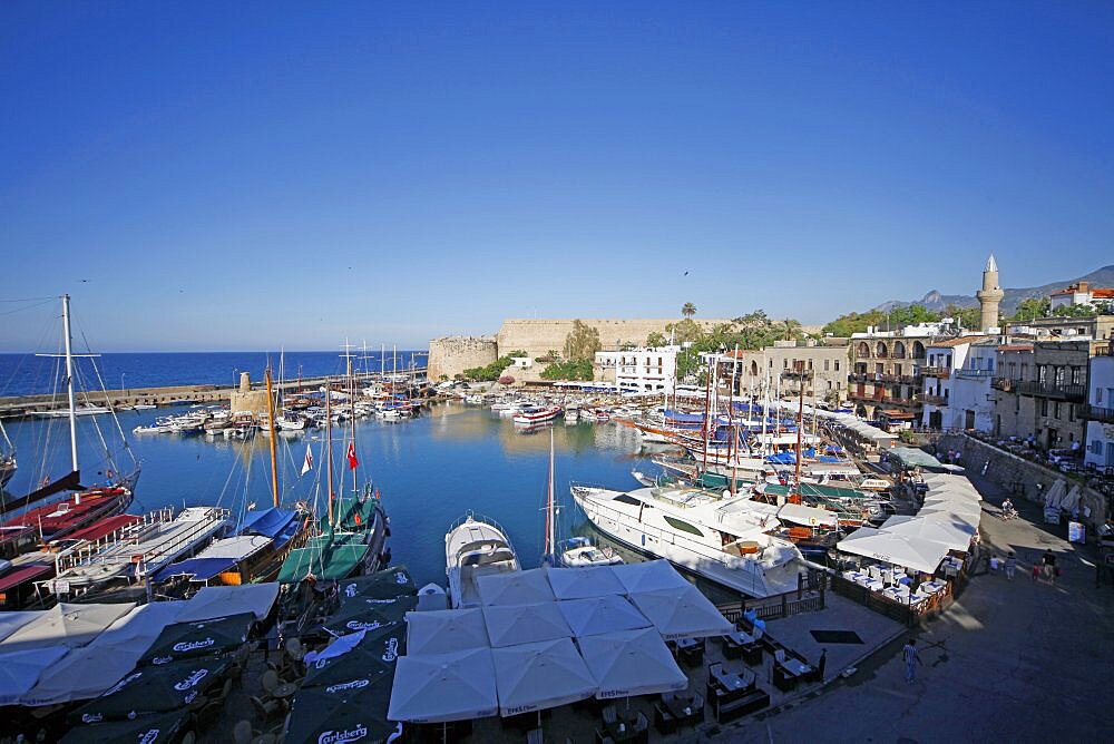 Boats in harbour and castle walls, Kyrenia, Northern Cyprus, Mediterranean, Europe