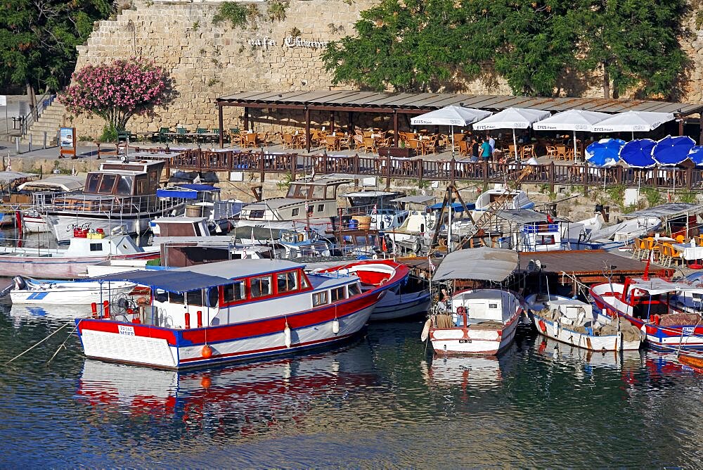 Boats in harbour and restaurant, Kyrenia, Northern Cyprus, Mediterranean, Europe