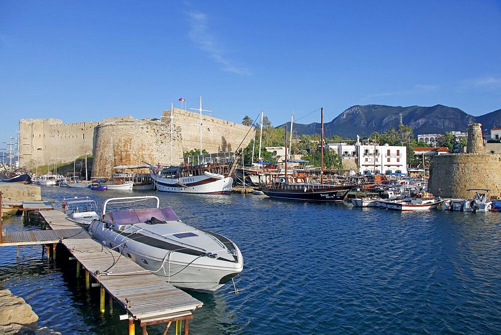 Boats in harbour and castle walls, Kyrenia, Northern Cyprus, Mediterranean, Europe