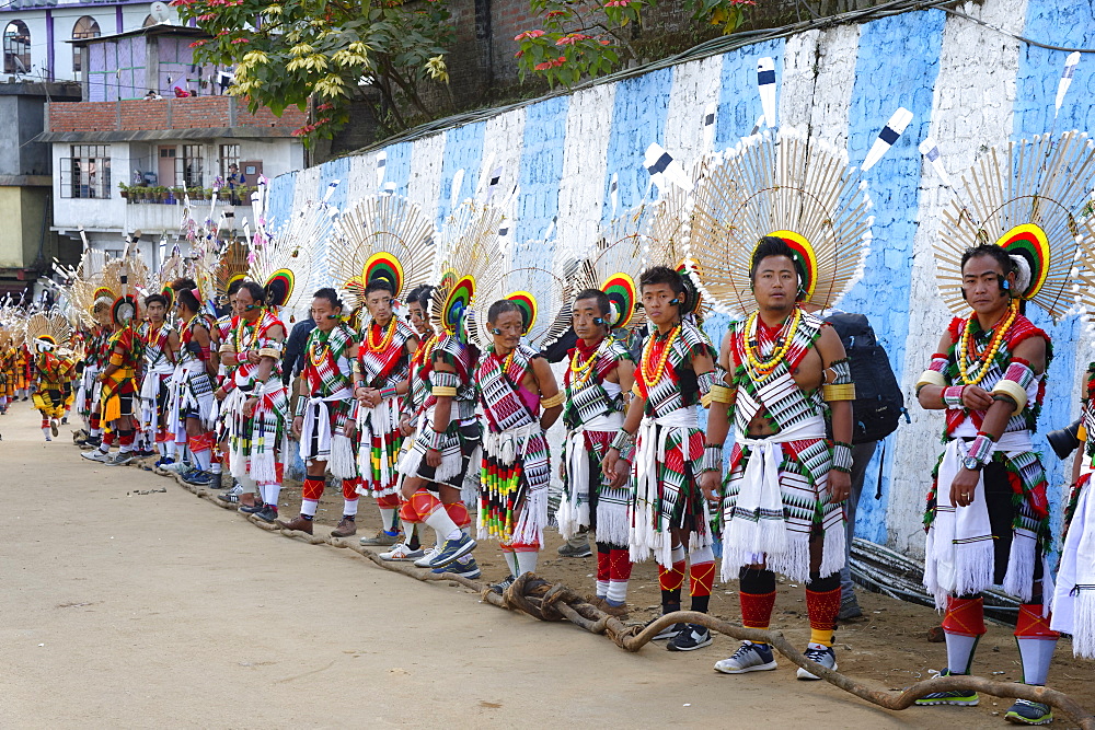 Naga tribesmen participating at the Stone pulling ceremony during Kisima Nagaland Hornbill festival, Kohima, Nagaland, India, Asia