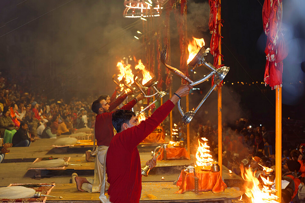 Priests celebrating the River Ganges, Aarti by offering incense, Dashashwamedh Ghat, Varanasi, Uttar Pradesh, India, Asia