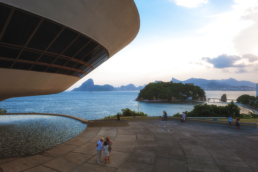 Niemeyer Museum of Contemporary Arts at sunset, and view over Sugar Loaf and Guanabara Bay, Niteroi, Rio de Janeiro, Brazil, South America 