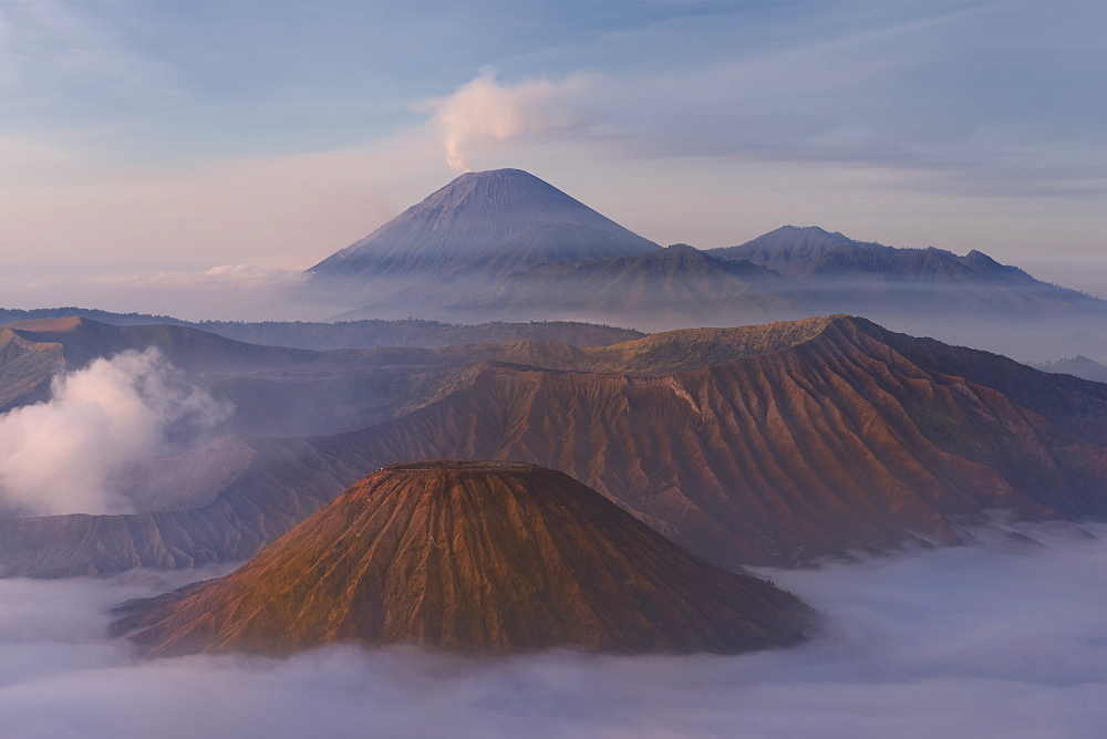 Sunrise over the smoking Gunung Bromo volcano, Bromo-Tengger-Semeru National Park, Java, Indonesia, Southeast Asia, Asia