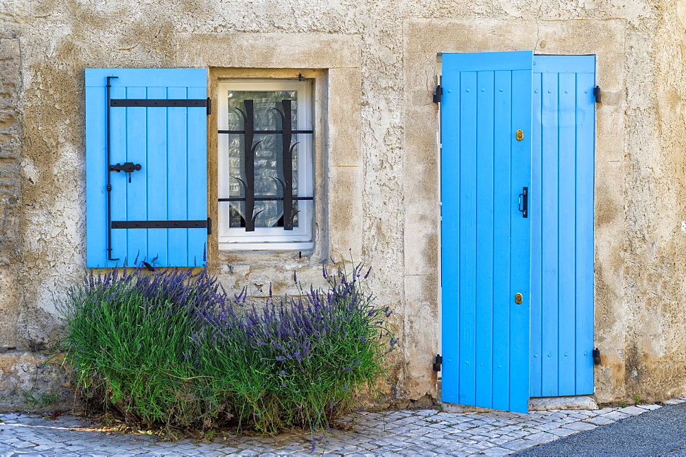 Blue shutter and door, Saint Remy de Provence, Bouches du Rhone, Provence Alpes Cote d'Azur region, France, Europe