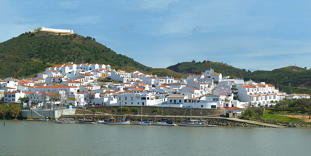 Sanlucar de Guadiana village seen from the Portuguese city Alcoutim, Spain, Europe