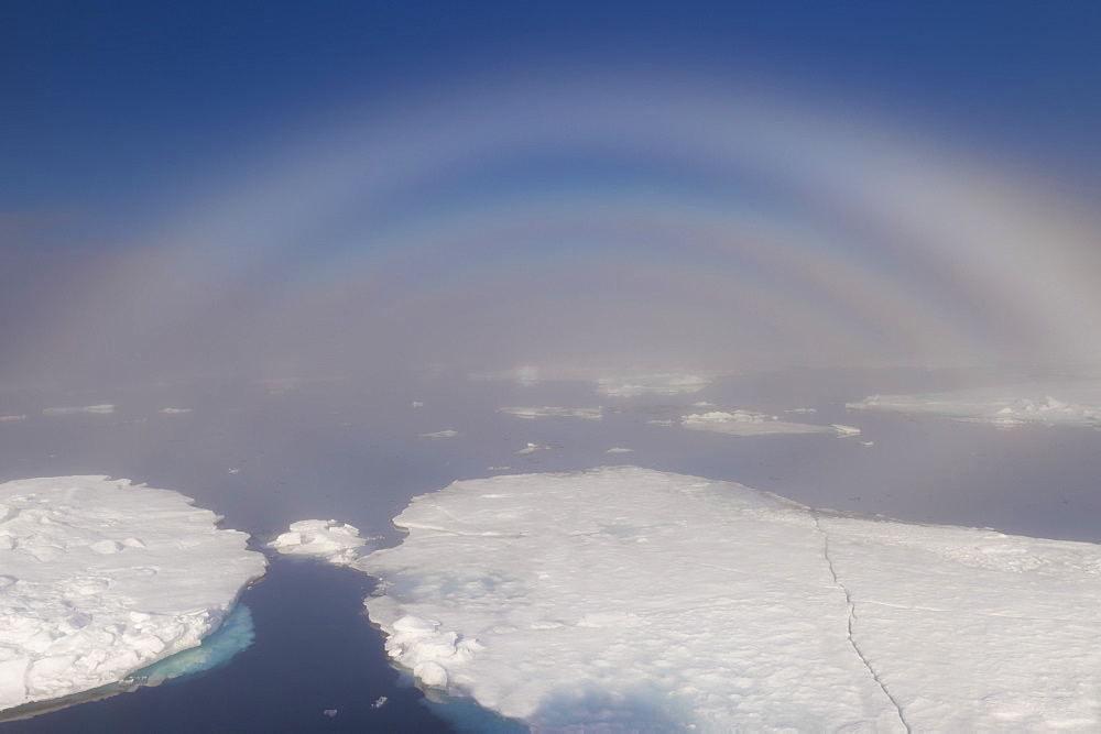 White rainbow over the ice, Arctic Ocean, Arctic, Norway, Scandinavia, Europe