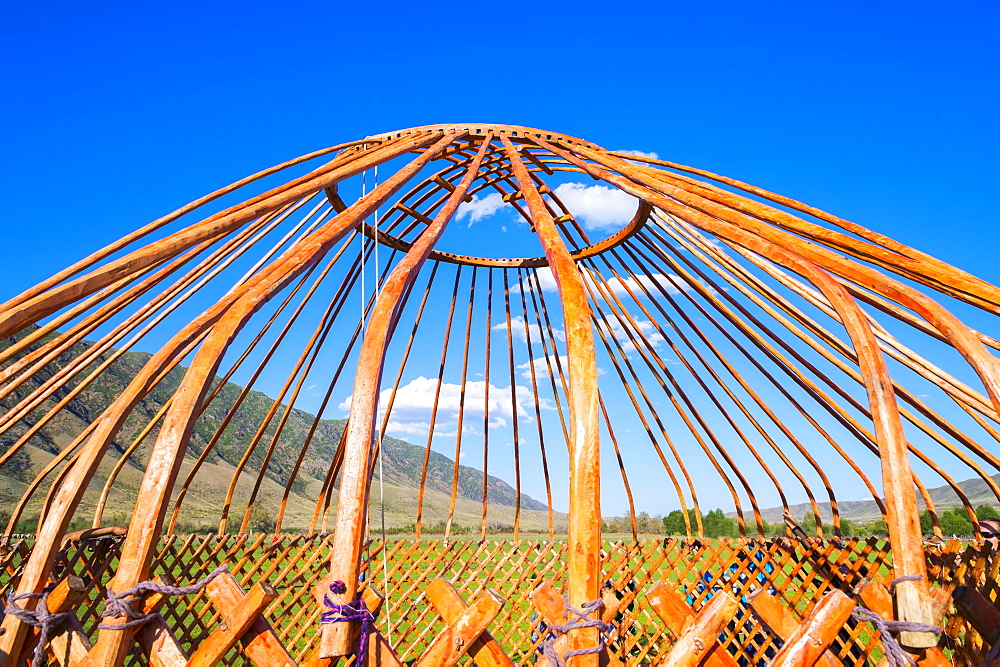 Kazakh men putting up a yurt, Sati village, Tien Shan Mountains, Kazakhstan, Central Asia, Asia