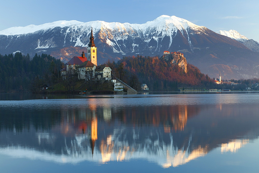 The Assumption of Mary Pilgrimage Church on Lake Bled and Bled Castle, Bled, Slovenia, Europe