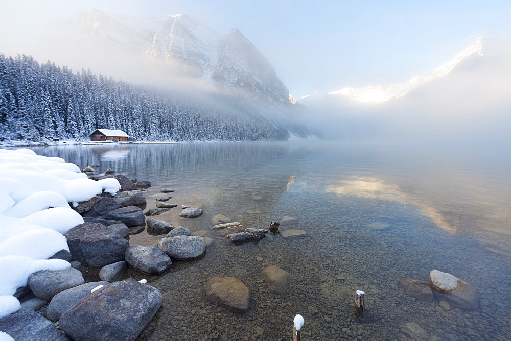 Foggy sunrise at Lake Louise, Banff National Park, UNESCO World Heritage Site, Rocky Mountains, Alberta, Canada, North America