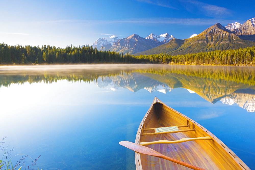 Canoe on Herbert Lake at sunrise, Banff National Park, UNESCO World Heritage Site, Alberta, Rocky Mountains, Canada, North America