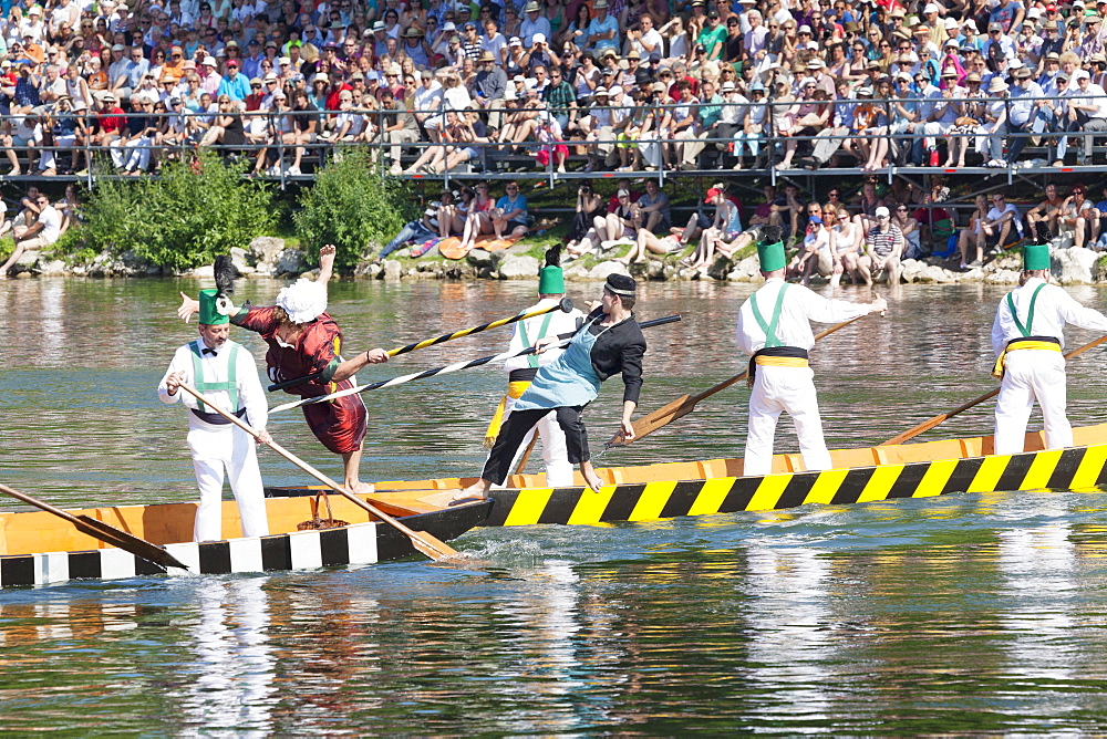 Historical characters on a boat during the contest on the Danube River, Fischerstechen, Ulm, Baden Wurttemberg, Germany, Europe