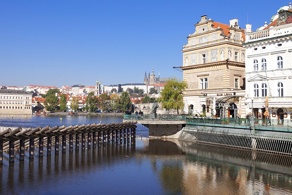 View over the River Vltava to Smetana Museum, Charles Bridge and the Castle District, Prague, Bohemia, Czech Republic, Europe