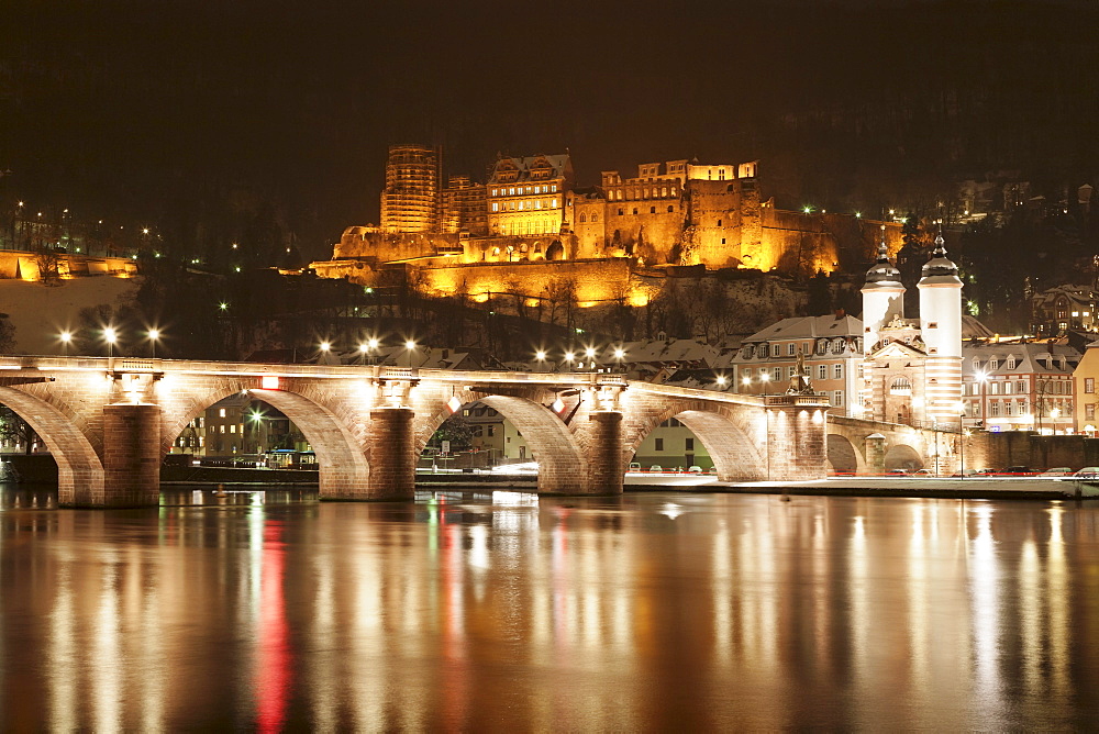 View over the Neckar River to Karl Theodor Bridge, Stadttor gate and castle in winter, Heidelberg, Baden Wurttemberg, Germany, Europe