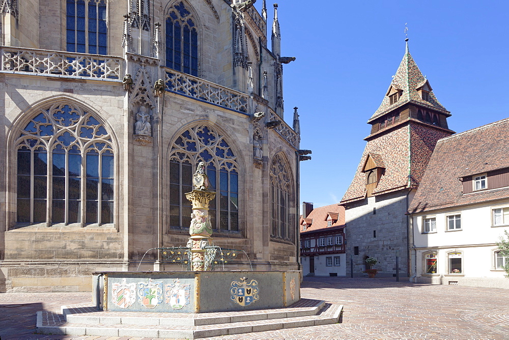 Lowenbrunnen Fountain, Heilig Kreuz Minster, belltower in the background, Schwabisch Gmund, Baden Wurttemberg, Germany, Europe