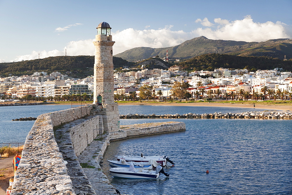 Lighthouse at old Venetian harbour, Rethymno (Rethymnon), Crete, Greek Islands, Greece, Europe