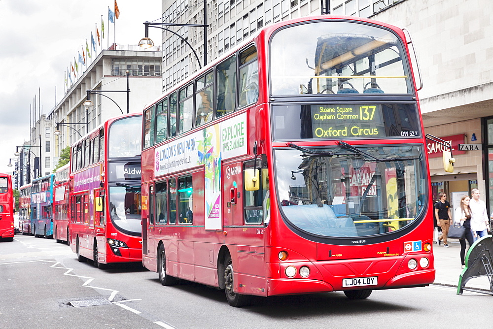 Red double decker bus on Oxford Street, London, England, United Kingdom, Europe