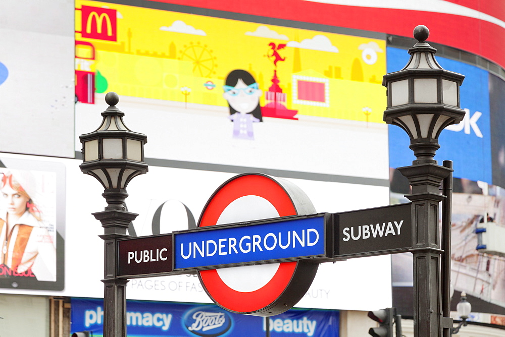 Entrance to tube station, advertisement, Piccadilly Circus, London, England, United Kingdom, Europe