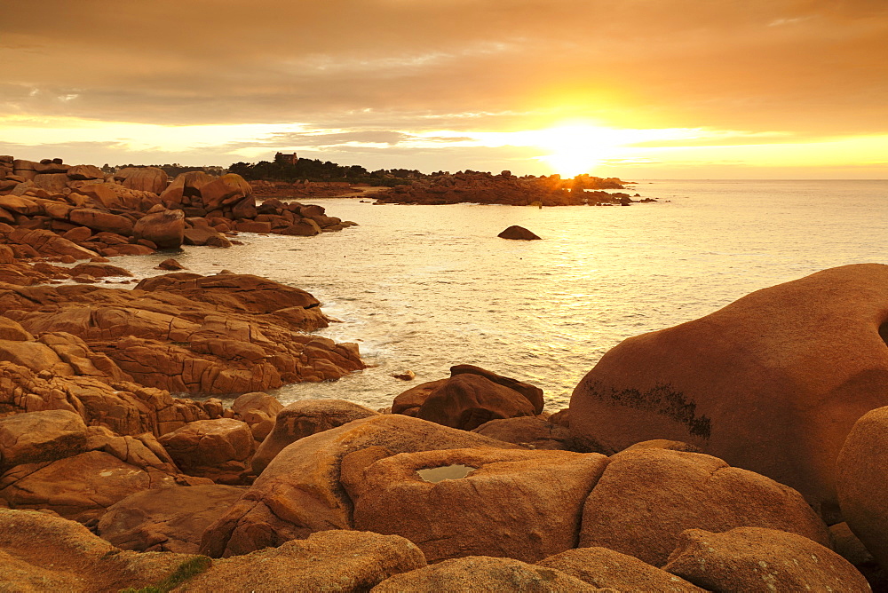 Rocks at the path Sentier des Douaniers on the Cote de Granit Rose at sunset, Cotes d'Armor, Brittany, France, Europe 