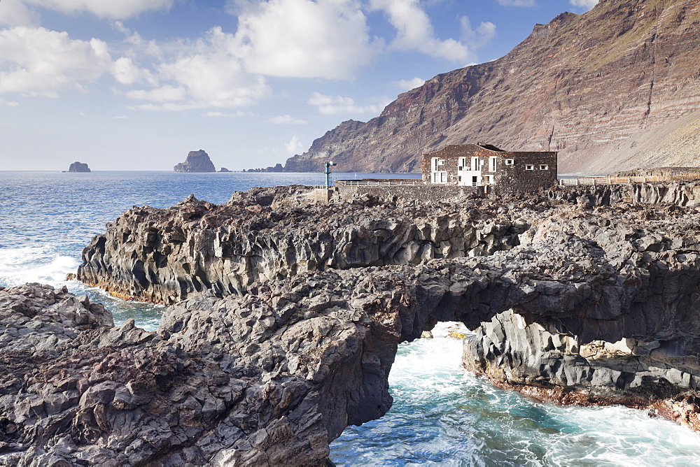 Rock arch and Hotel Punta Grande, Las Puntas, El Golfo, lava coast, UNESCO biosphere reserve, El Hierro, Canary Islands, Spain, Atlantic, Europe