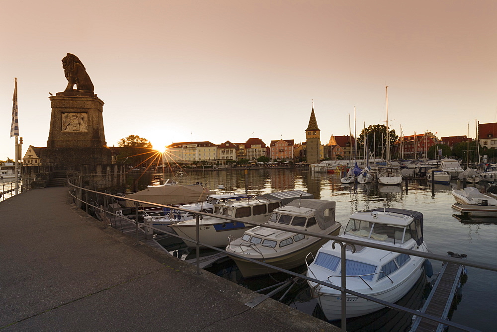 Bavarian Lion and Mangturm at the port at sunset, Lindau, Lake Constance, Bavaria, Germany, Europe