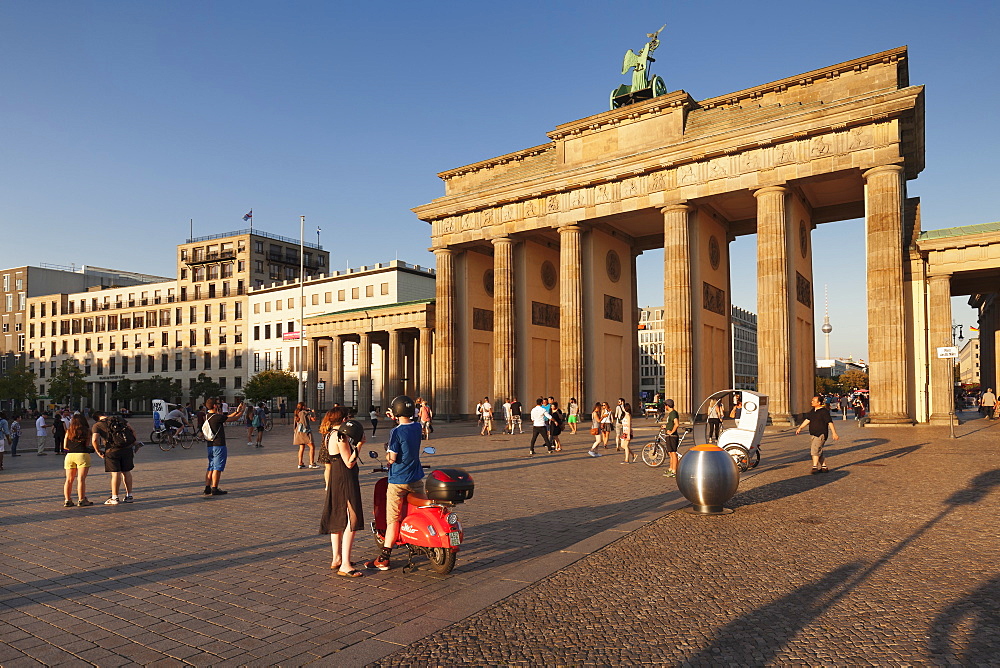 Brandenburg Gate (Brandenburger Tor) at sunset, Platz des 18 Marz, TV Tower, Berlin Mitte, Berlin, Germany, Europe