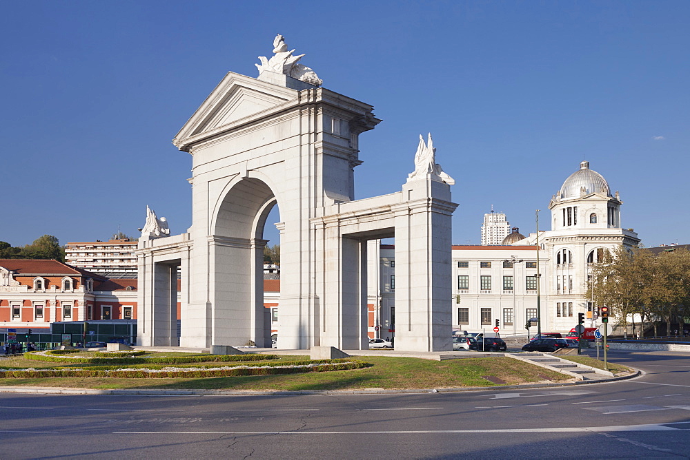 Puerta de San Vicente Gate with Principe Pio Station, Glorieta de San Vicente in the background, Madrid, Spain, Europe