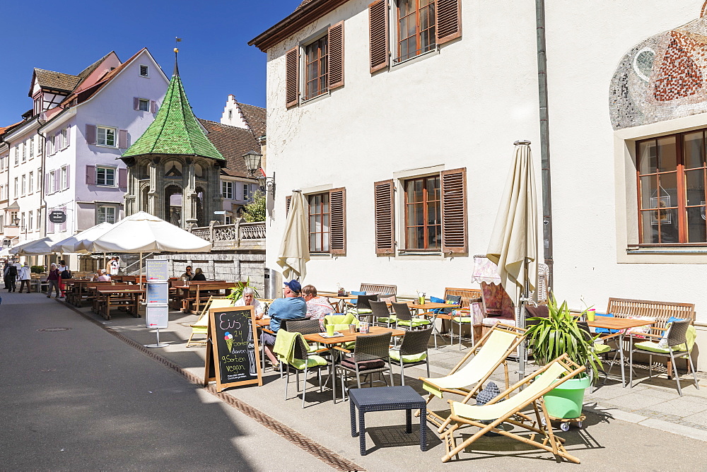 Street cafe on pedestrian area Munsterstrasse, Oelbergkapelle Chapel in the back, Uberlingen, Lake Constance, Baden-Wurttemberg, Germany, Europe