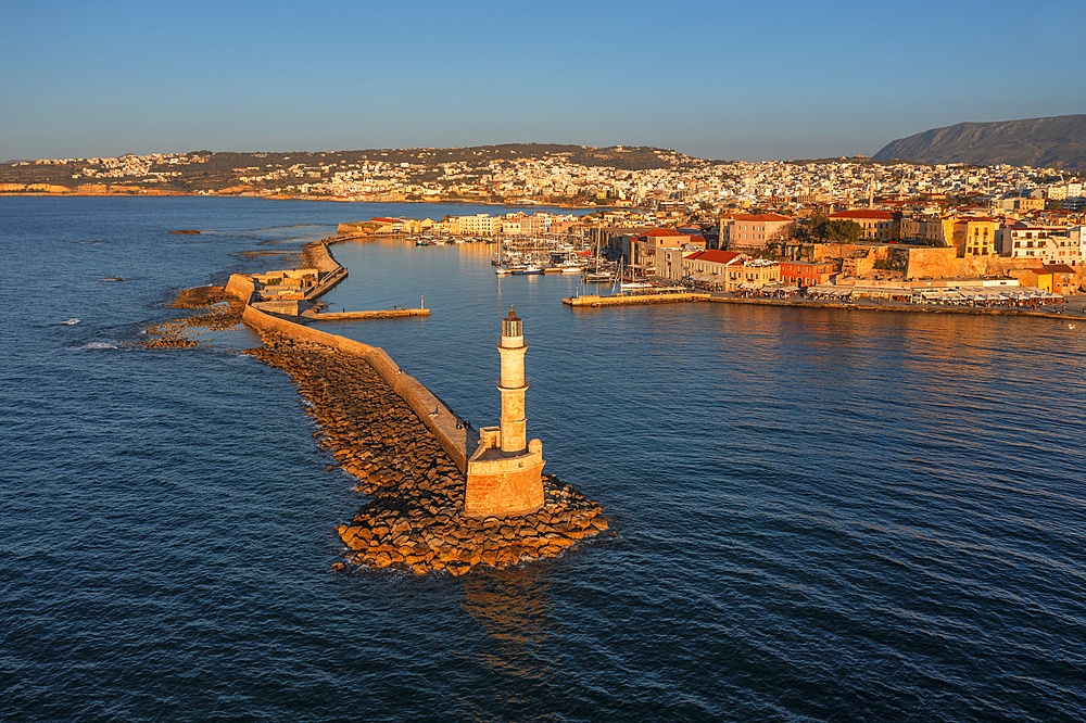 Lighthouse at the Venetian harbor and old town of Chania, Crete, Greek Islands, Greece, Europe