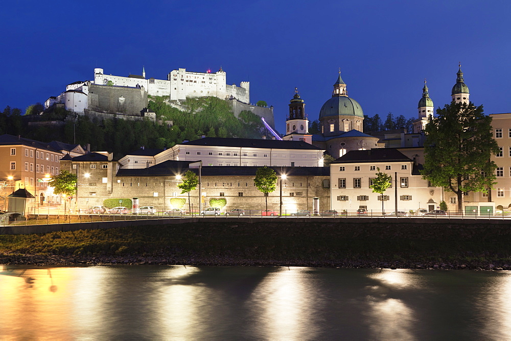 Old Town, UNESCO World Heritage Site, and Castle Hohensalzburg, Cathedral, Kollegienkirche church and the River Salzach at dusk, Salzburg, Salzburger Land, Austria, Europe 