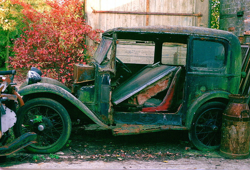 A run-down 1933 Austin classic motor car awaiting restoration and renovation in Gloucestershire, United Kingdom