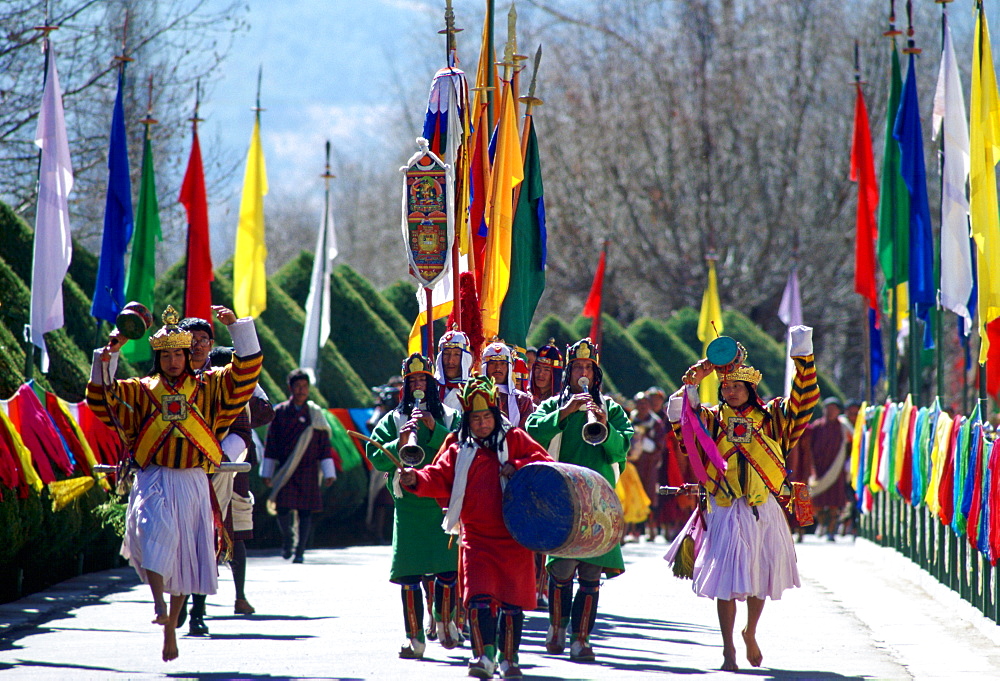 Musicians lead royal procession to King's palace, Tashichho Dzong, Thimpu, Bhutan