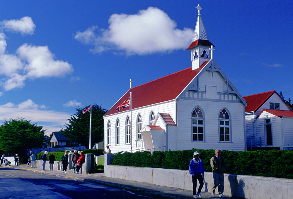 People walking along Main Street in Port Stanley, Falkland Islands