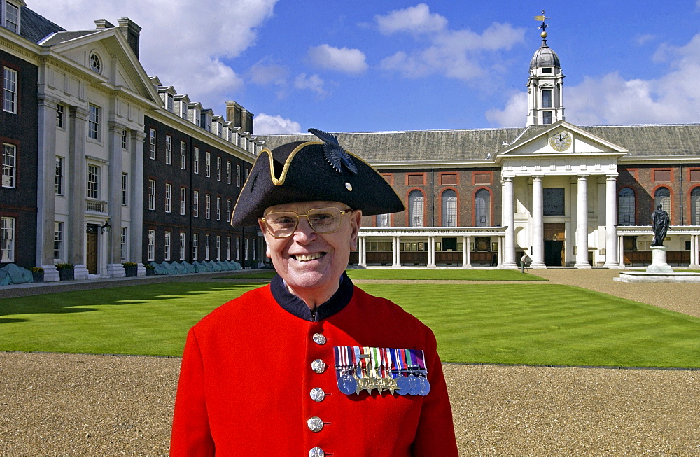 A Chelsea pensioner standing outside the Royal Hospital Chelsea, London