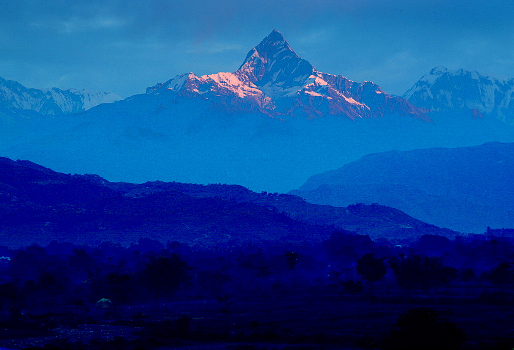 Fish Tail Mountain - Machhapuchhare - in the Himalayas Mountains, Nepal at dawn.