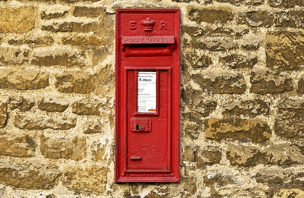 Wall Mounted Post-Box showing the cipher ER for the reign of Queen Elizabeth II, Burford