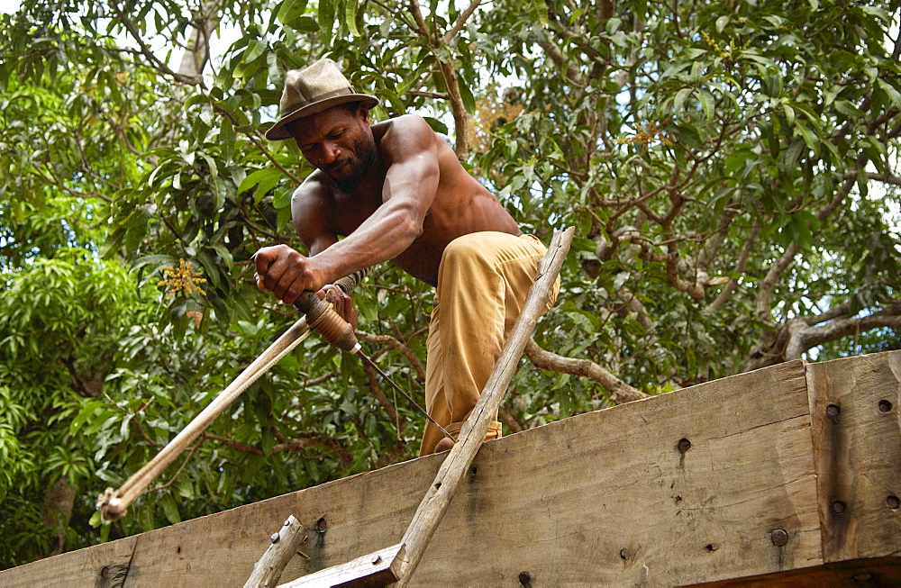 Carpenter Building a Boat, Zanzibar