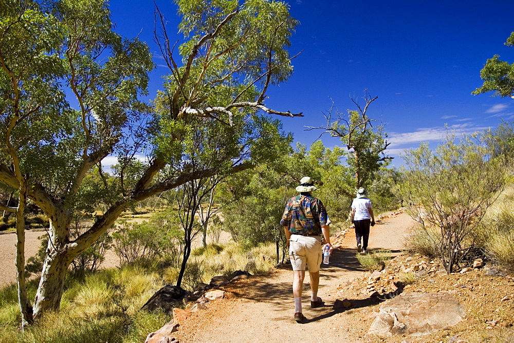 Tourists at Simpson's Gap, in West Madonnell Mountain Range, Red Centre, Australia