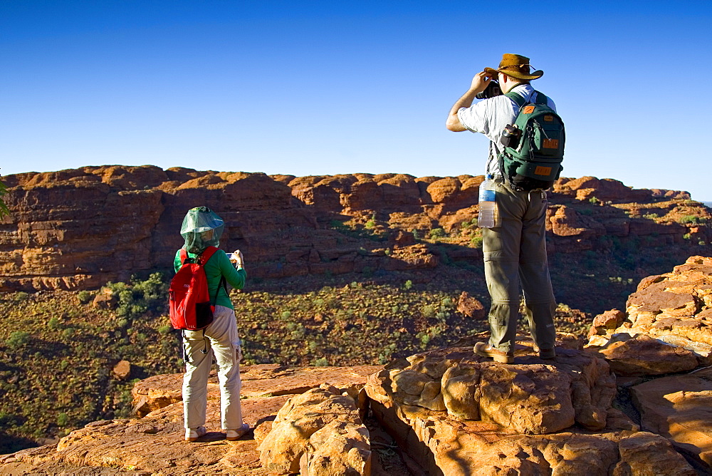 Tourists on the rim of King's Canyon, Red Centre, Northern Territory, Australia