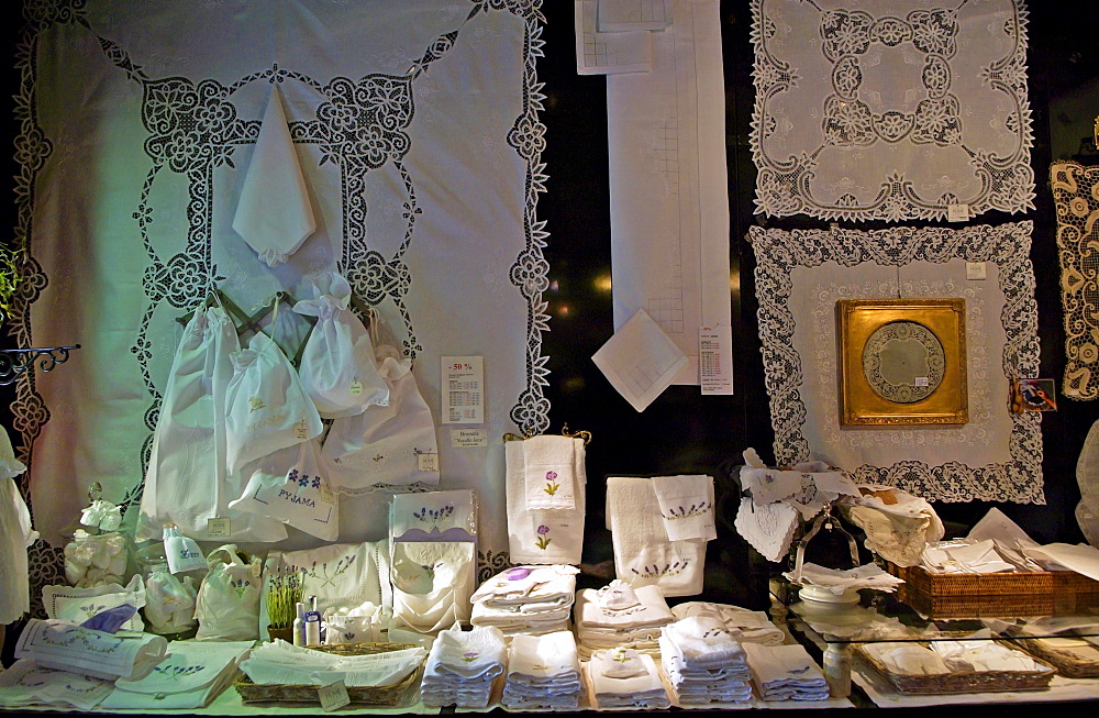 Display of white linen in draper's shop in Kloskanthuis, Ghent, Belgium