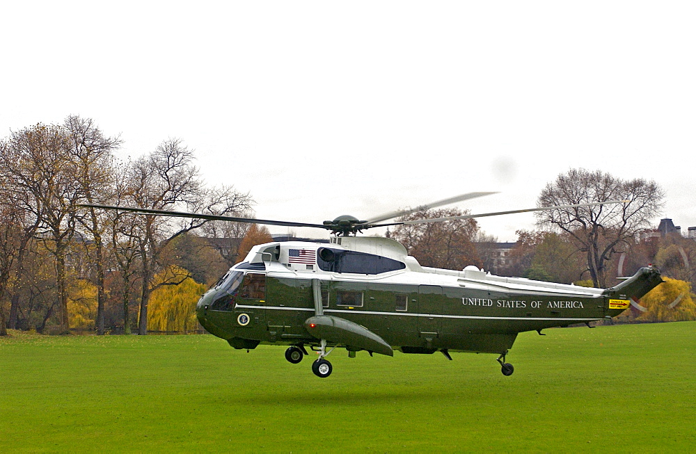 President George W Bush with his wife Laura leaving by helicopter after his official visit to Britain