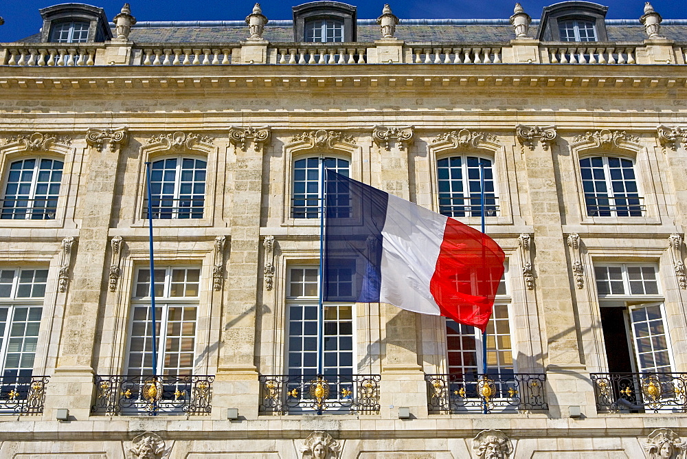 French flag at Place de la Bourse in Bordeaux, France