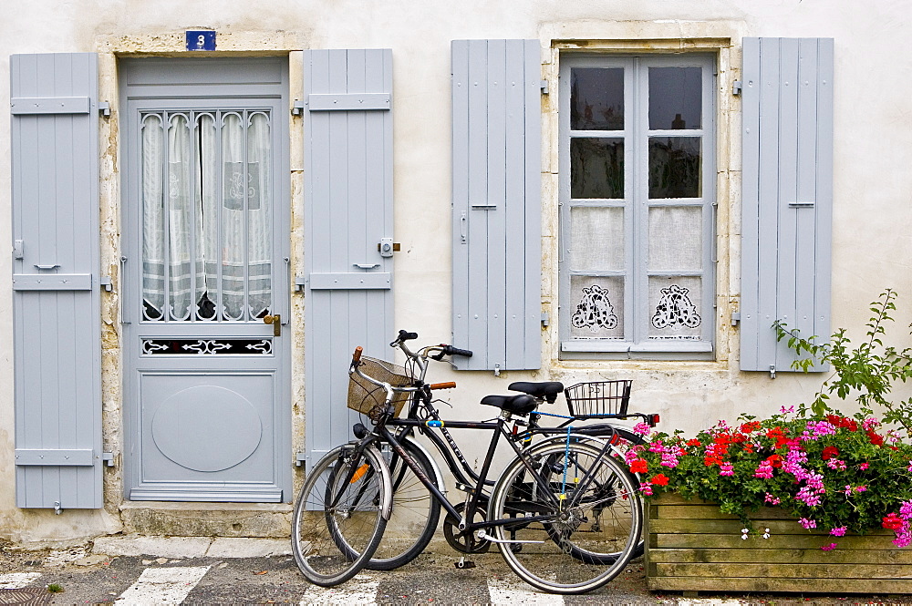 Traditional home with bicycles, Ile De Re, France.