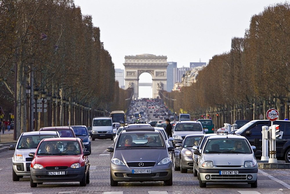 Traffic stops at pedestrian crossing on Champs-?lys?es, Central Paris, France