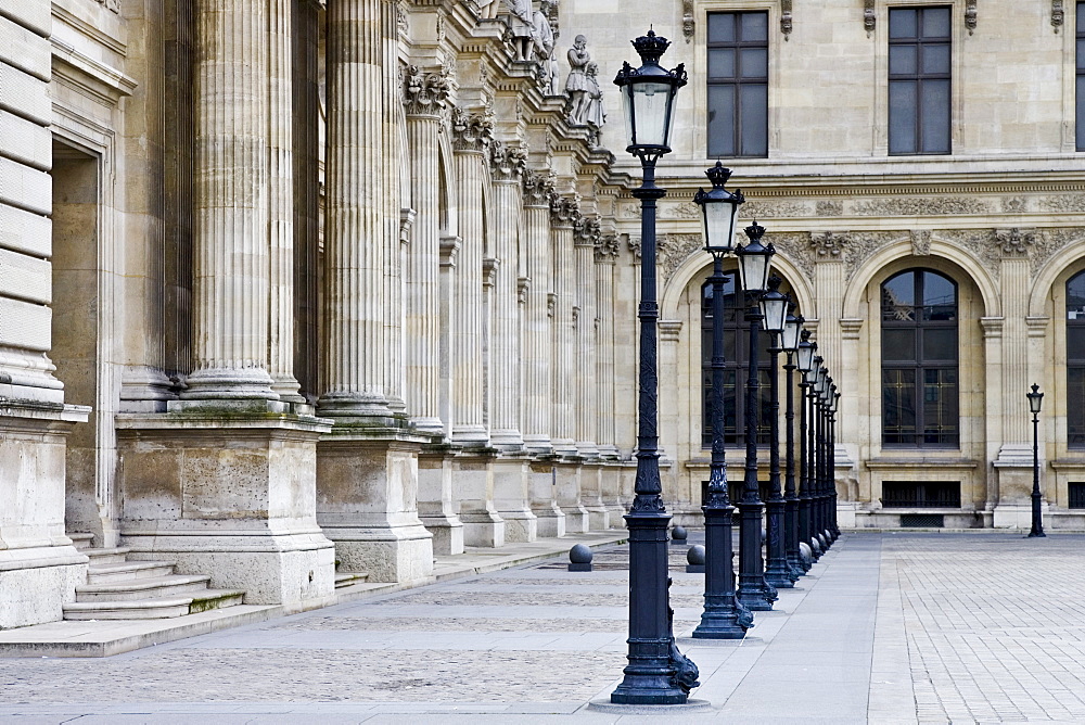 Row of street lights by Louvre Museum, Paris, France