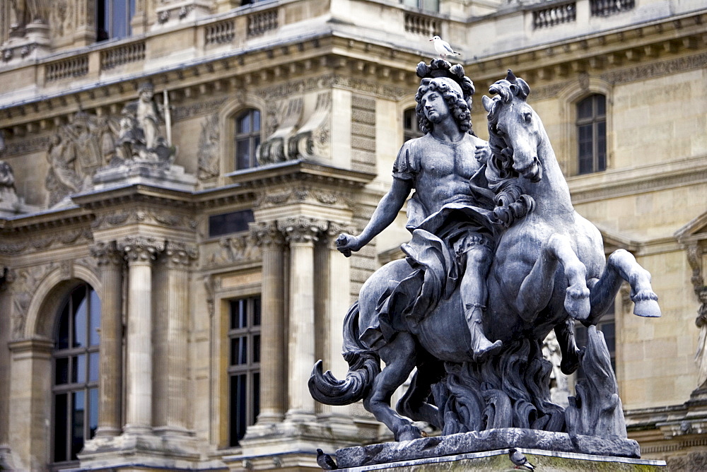 Statue of Louis XIV outside Louvre Museum, Paris, France