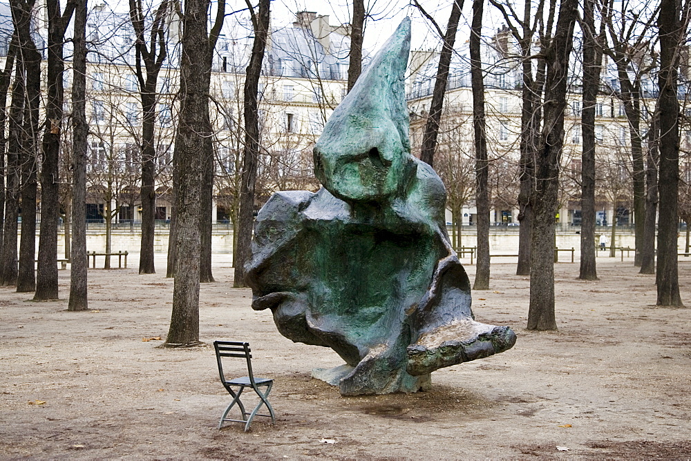 Sculpture and chair from which to observe it in Jardin des Tuileries, Paris, France