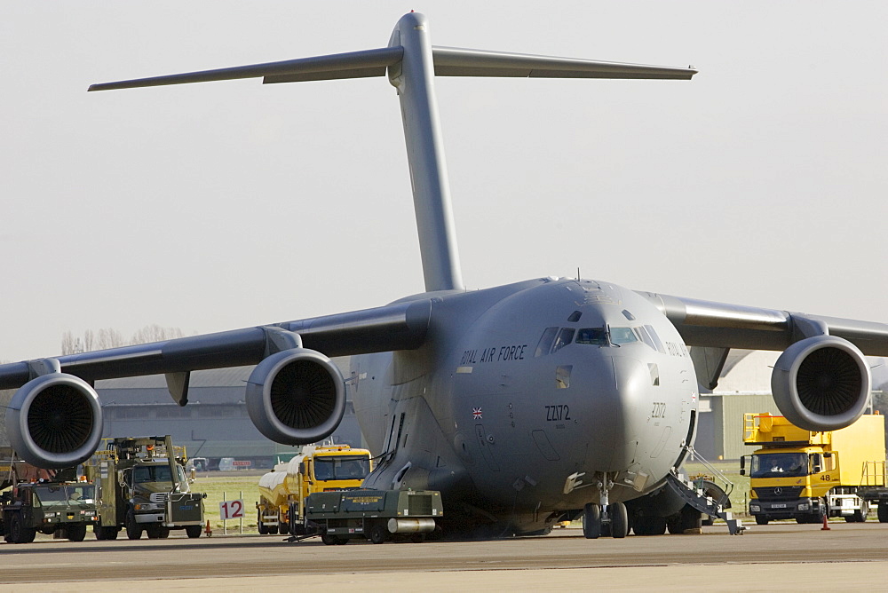 C17 transport plane and ground support at RAF Brize Norton in Oxfordshire, United Kingdom